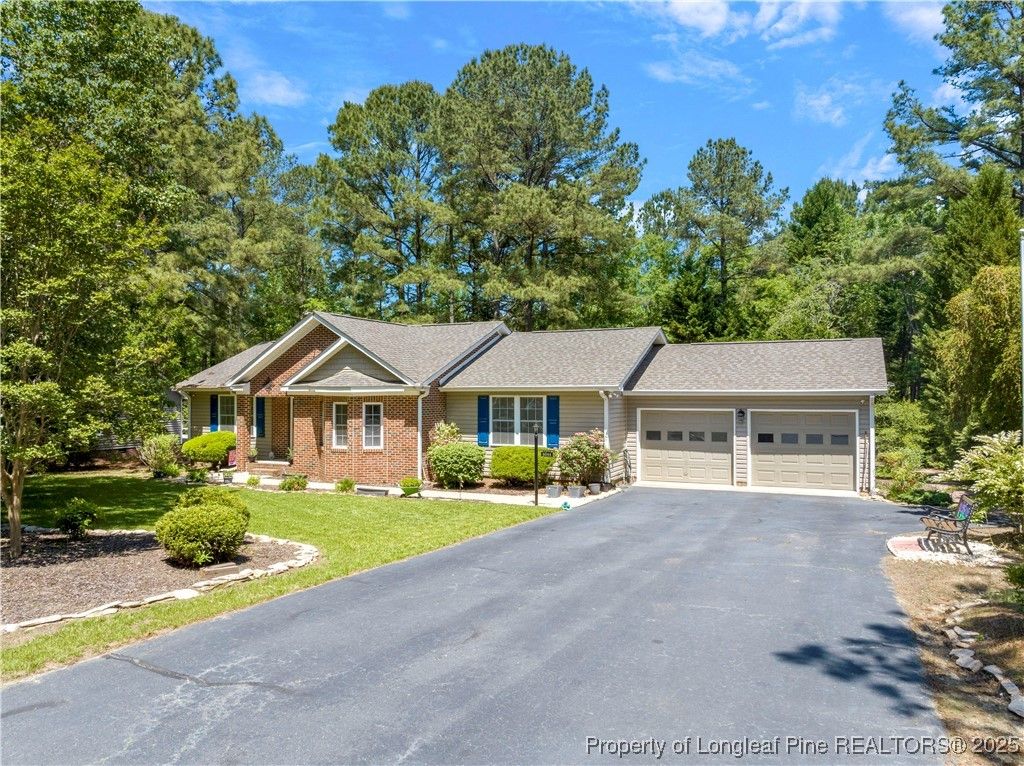 Photo of 6044 Saint Andrews Drive, Sanford, NC 27332 (MLS # 742157)