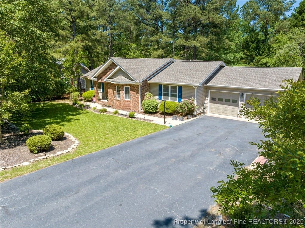 Photo of 6044 Saint Andrews Drive, Sanford, NC 27332 (MLS # 742157)