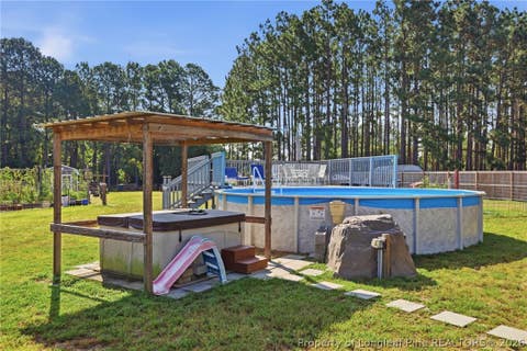 Tiny photo for 1008 Minnie Hall Road, Autryville, NC 28318 (MLS # 768173)