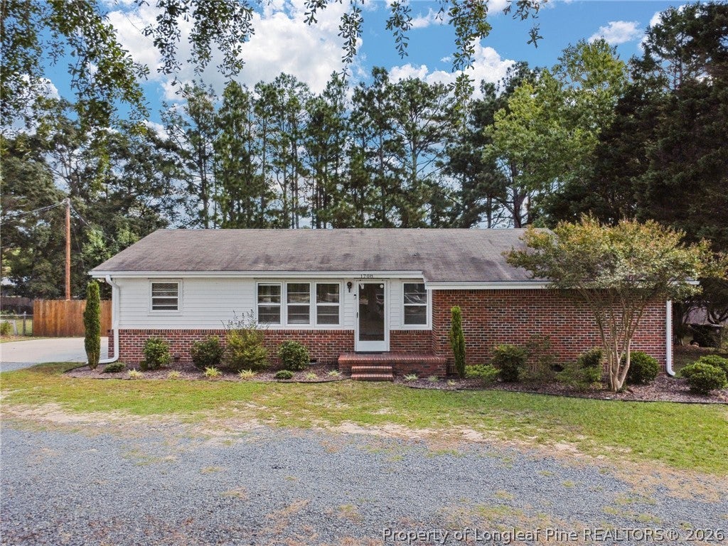 Photo of 1708 N Poplar Street, Aberdeen, NC 28315 (MLS # 769320)