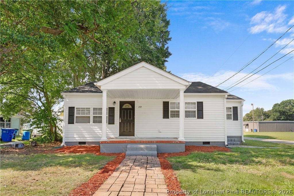 Photo of 219 W Brocklyn Street, Benson, NC 27504 (MLS # 768416)