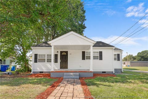 Photo of 219 W Brocklyn Street, Benson, NC 27504 (MLS # 768416)