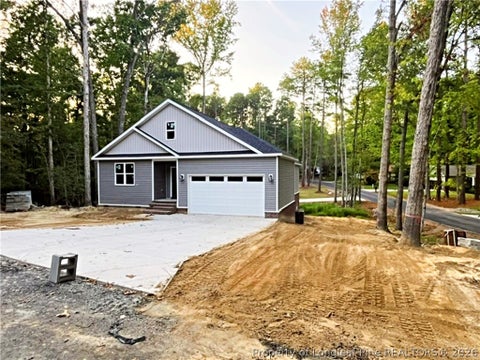 Photo of 5117 Pheasant Lane, Sanford, NC 27332 (MLS # 769984)