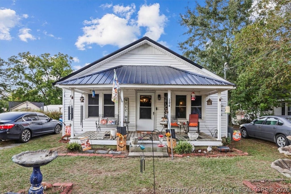 Photo of 204 Jackson Street, Salemburg, NC 28385 (MLS # 771075)