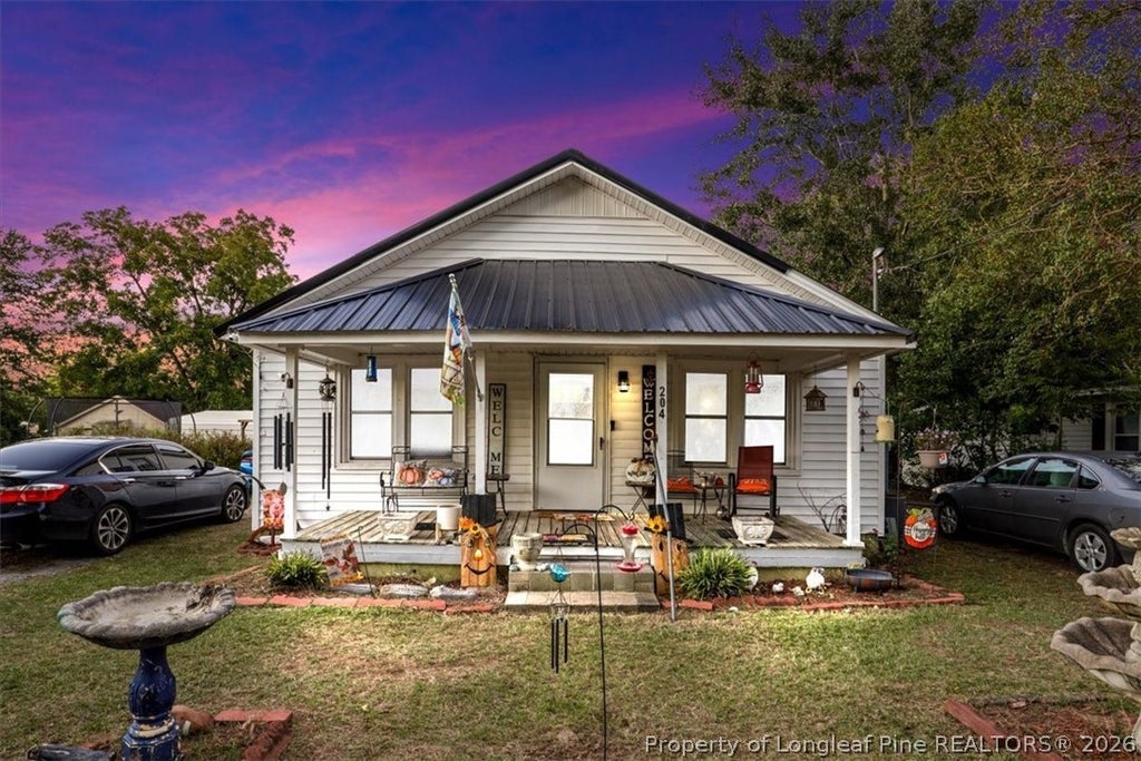 Photo of 204 Jackson Street, Salemburg, NC 28385 (MLS # 771075)