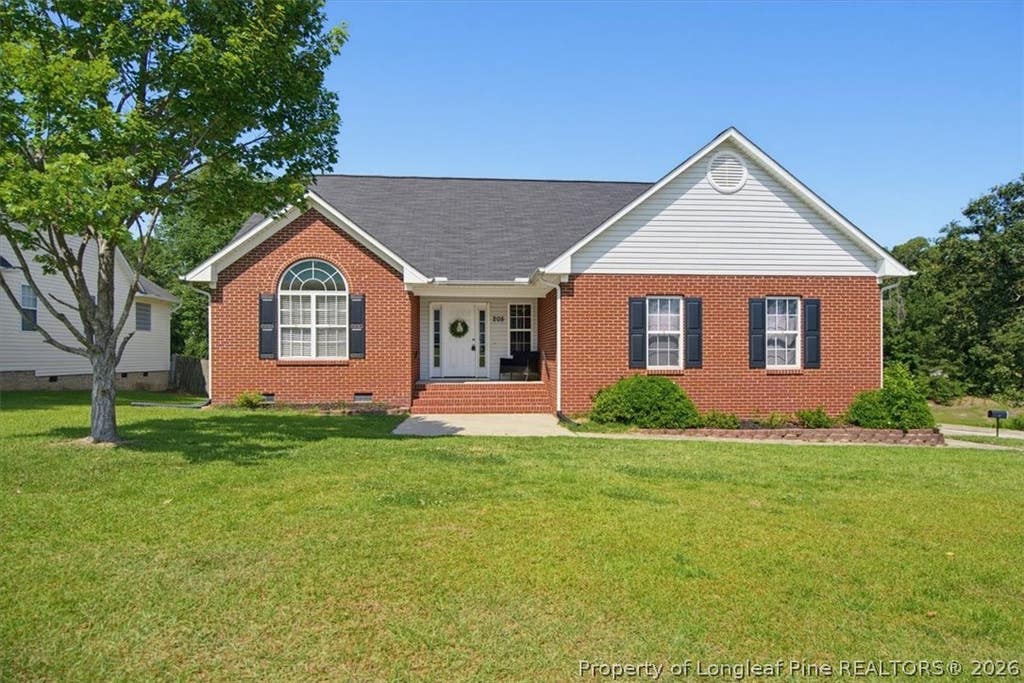 Photo of 205 Woodland Drive, Raeford, NC 28376 (MLS # 764310)