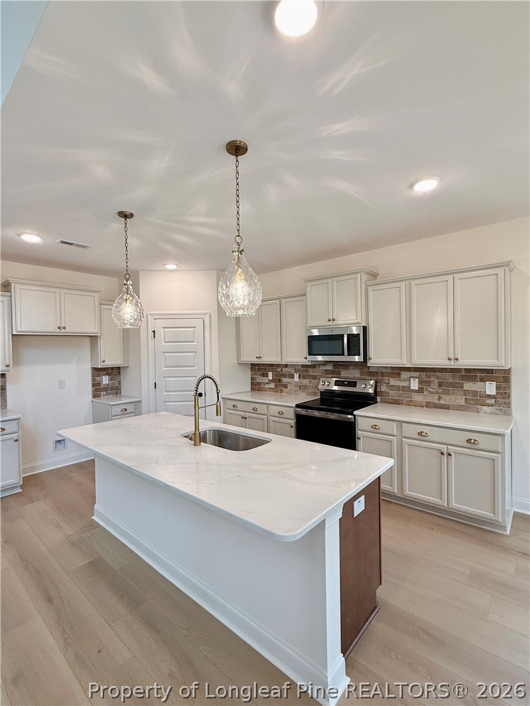 Photo of 215 Whispering Ridge, West End, NC 27376 (MLS # 768800)