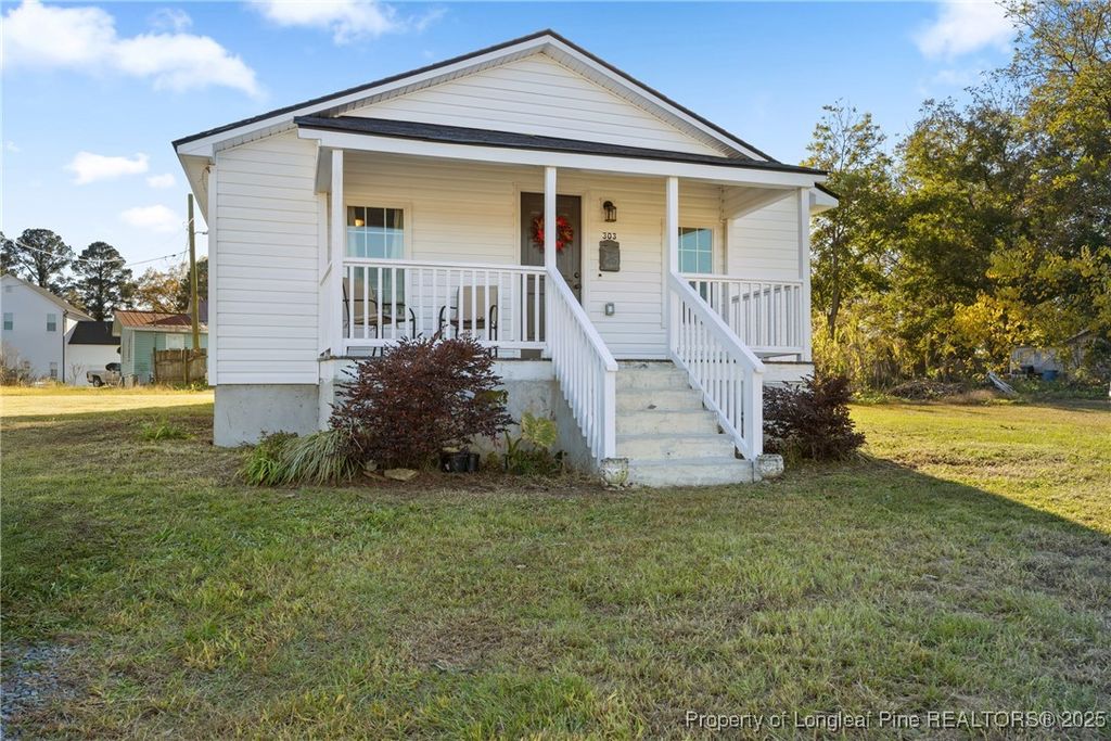 Photo of 303 W Martin Street, Benson, NC 27504 (MLS # 753014)