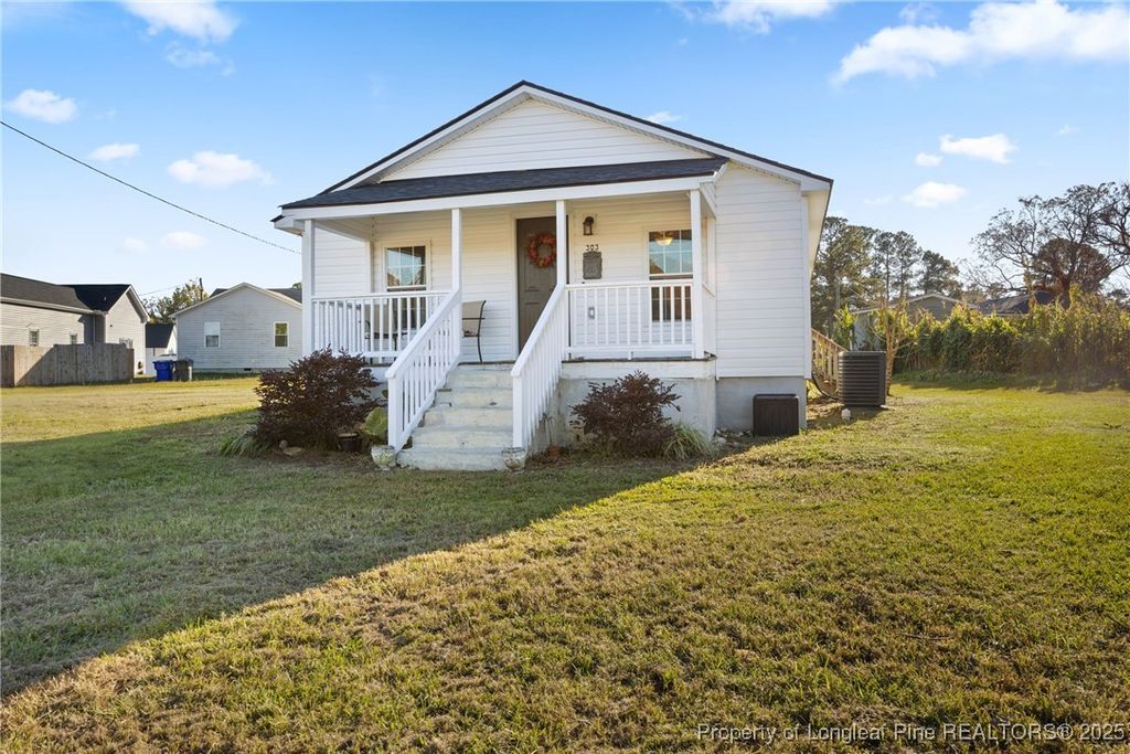 Photo of 303 W Martin Street, Benson, NC 27504 (MLS # 753014)