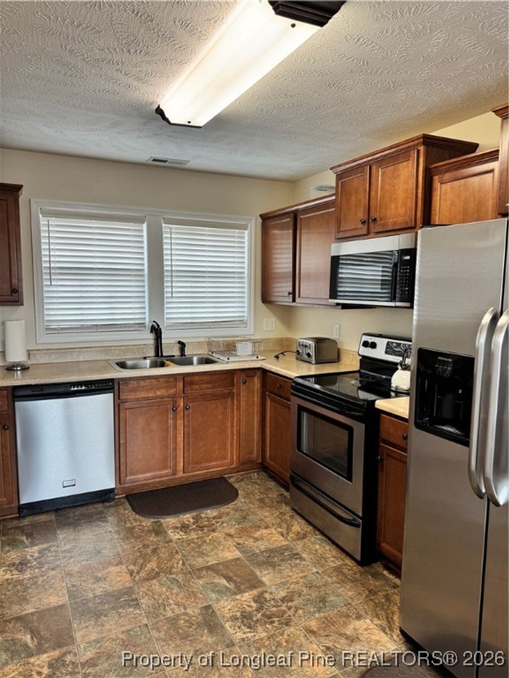 Photo of 96 Downing Court, Lillington, NC 27546 (MLS # 755627)