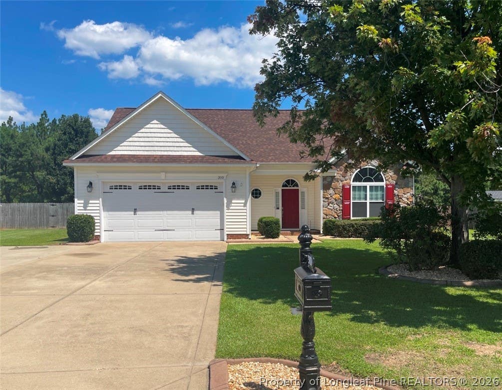 Photo of 310 Oakridge Drive, Raeford, NC 28376 (MLS # 767013)