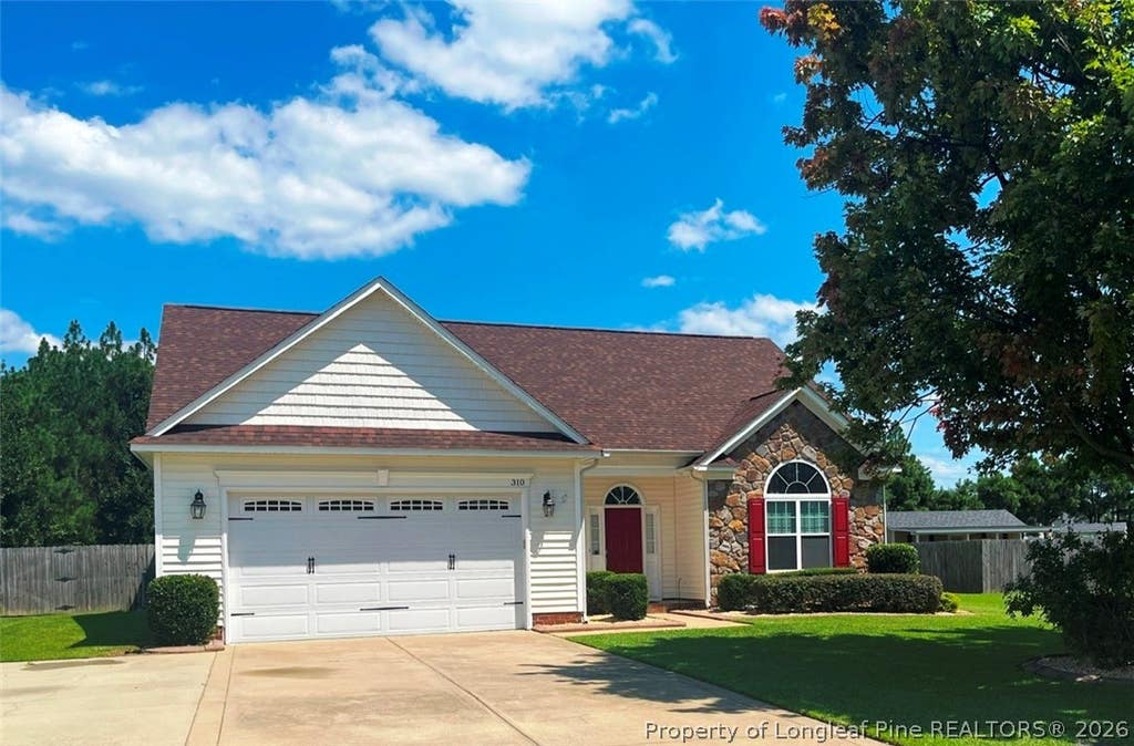 Photo of 310 Oakridge Drive, Raeford, NC 28376 (MLS # 767013)