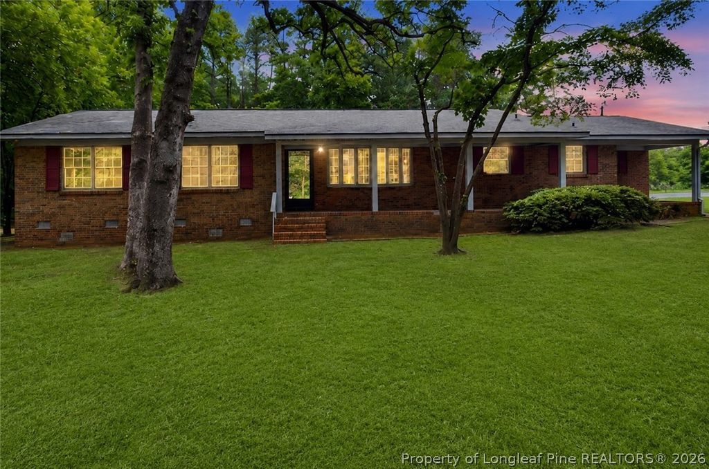 Photo of 300 Par Lane, Lumber Bridge, NC 28357 (MLS # 763108)