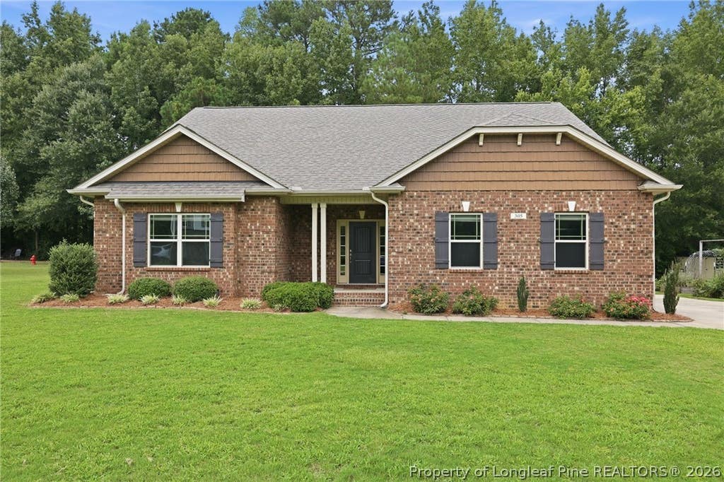 Photo of 305 Planters Lane, Coats, NC 27521 (MLS # 766831)