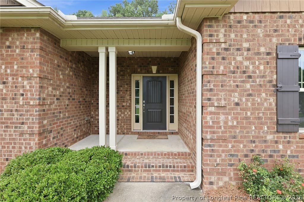 Photo of 305 Planters Lane, Coats, NC 27521 (MLS # 766831)