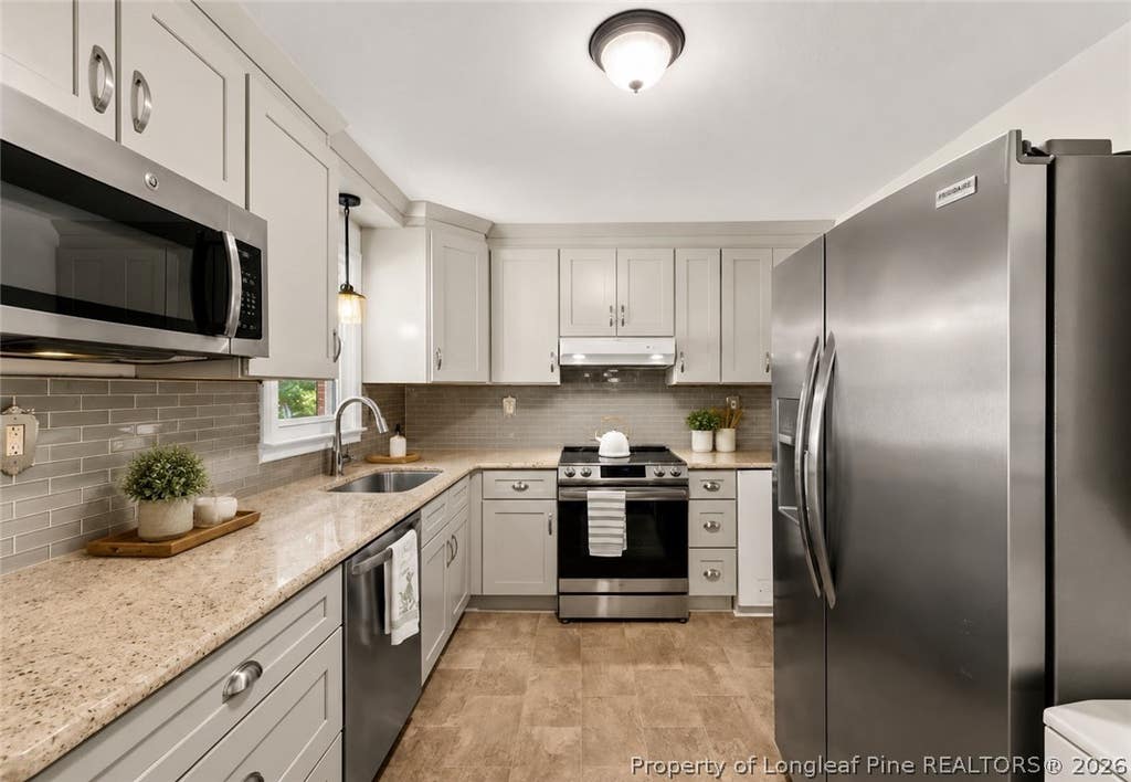 Photo of 4332 Lakeside Drive, Fayetteville, NC 28311 (MLS # 768054)