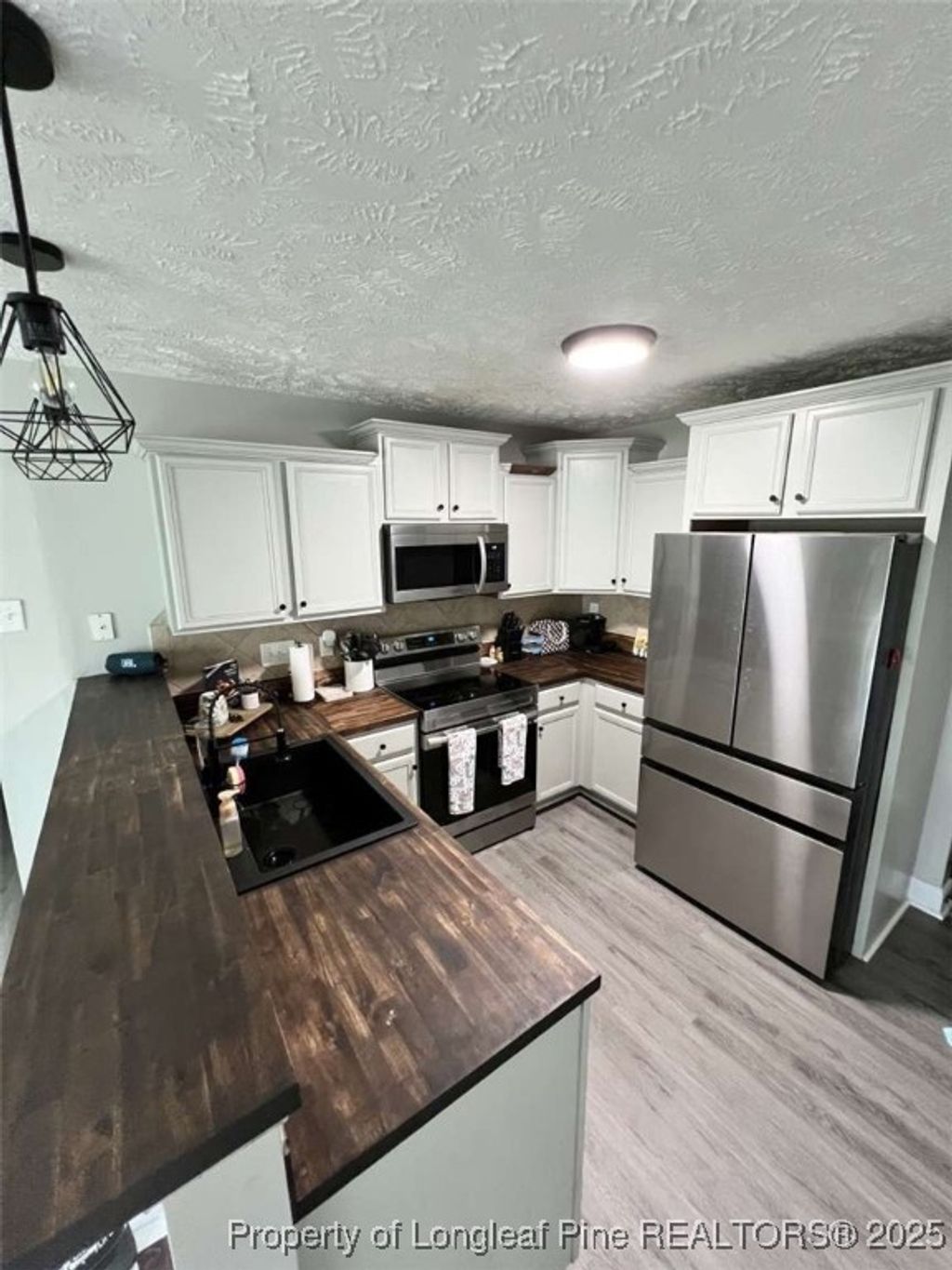 Photo of 2134 Queen Elizabeth Lane, Hope Mills, NC 28348 (MLS # 748832)