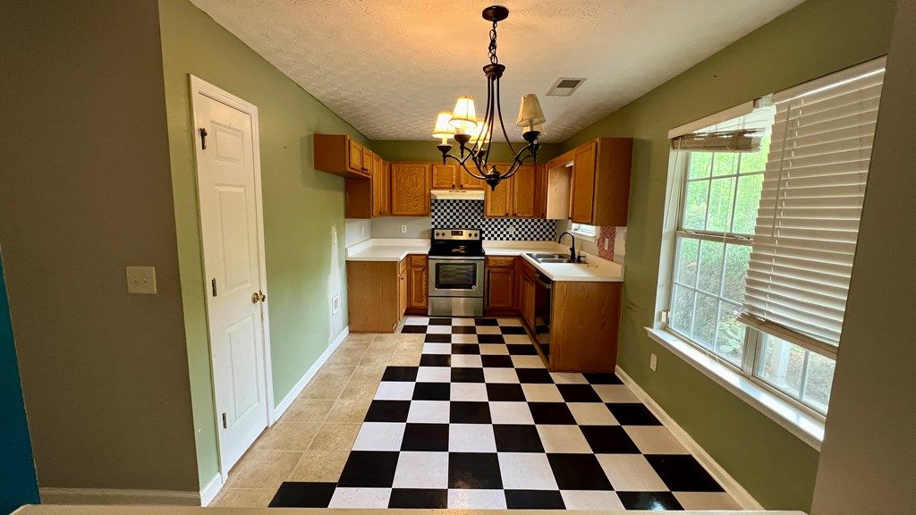 Photo of 195 Creekside Drive, GRANTVILLE, GA 30220 (MLS # 231291)