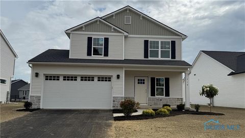 Photo of 719 W Ironwood Drive, Rossford, OH 43460 (MLS # 10000760)