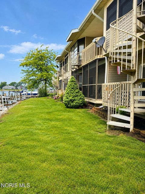 Photo of 6512 N Harris Harbor Drive, Oak Harbor, OH 43449 (MLS # 10008405)