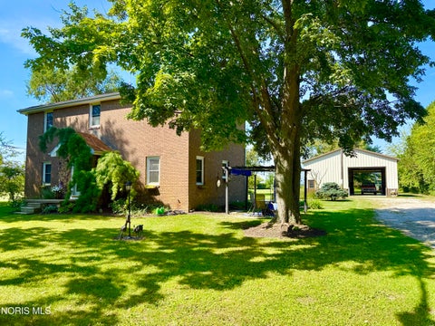 Photo of 1031 N Cousino Road, Oregon, OH 43616 (MLS # 10012829)