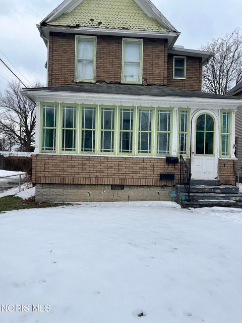 Photo of 317 Chicago Street, Toledo, OH 43611 (MLS # 10004214)