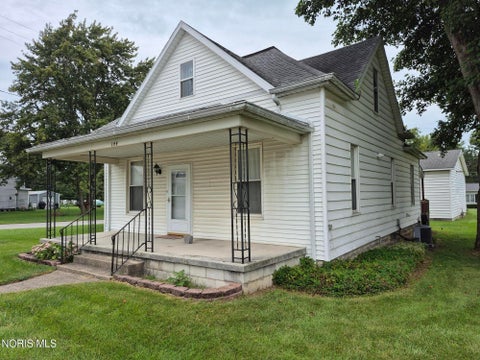 Photo of 144 W Cooper Street, McComb, OH 45858 (MLS # 10013398)