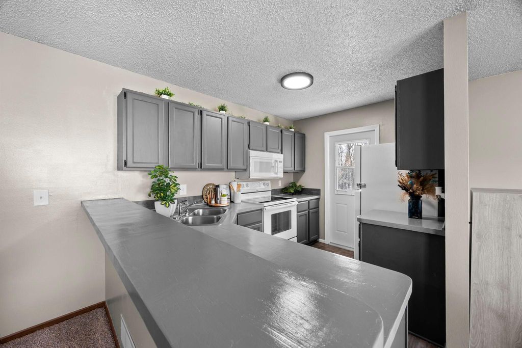 Photo of 2661 Brookdale Lane, Brooklyn Park, MN 55444 (MLS # 7040835)