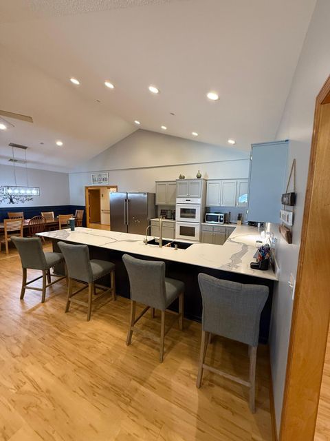 Photo of 710 Park Island Drive SW, Hutchinson, MN 55350 (MLS # 6824021)