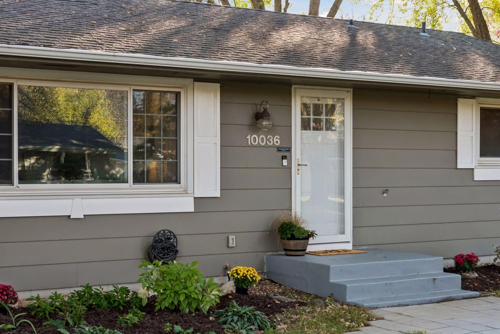 Photo of 10036 Nathan Lane N, Maple Grove, MN 55369 (MLS # 7146436)