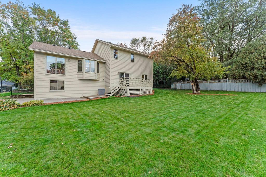 Photo of 322 74th Avenue N, Brooklyn Park, MN 55444 (MLS # 7056079)