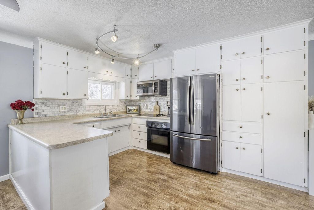 Photo of 1800 Edward Street, Maplewood, MN 55109 (MLS # 7017541)