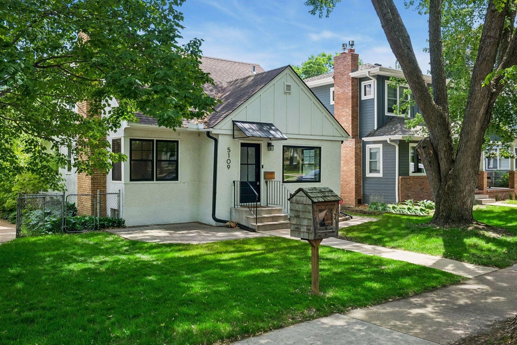 Photo of 5109 Abbott Avenue S, Minneapolis, MN 55410 (MLS # 7111062)