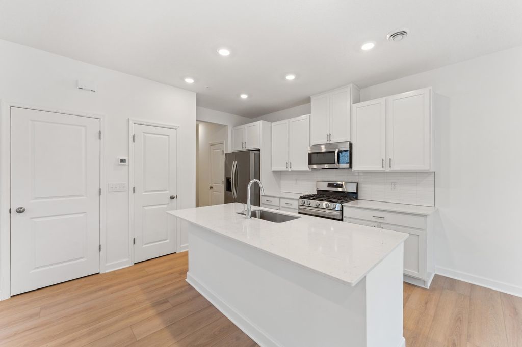 Photo of 10548 Harbor Lane N, Maple Grove, MN 55369 (MLS # 7047083)