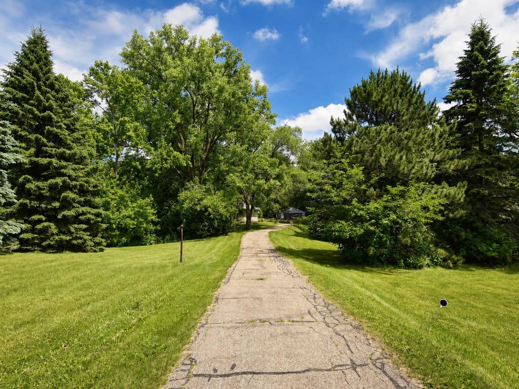 Photo of 7722 Babcock Trail, Inver Grove Heights, MN 55077 (MLS # 7100730)