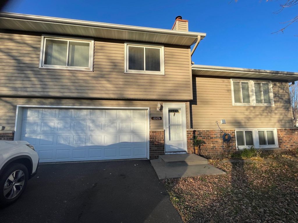 Photo of 6005 64th Avenue #6005, Brooklyn Park, MN 55429 (MLS # 7001990)