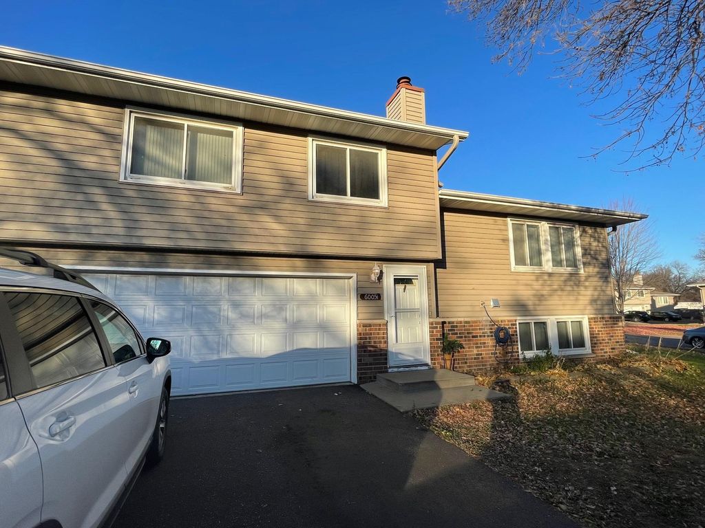 Photo of 6005 64th Avenue #6005, Brooklyn Park, MN 55429 (MLS # 7001990)