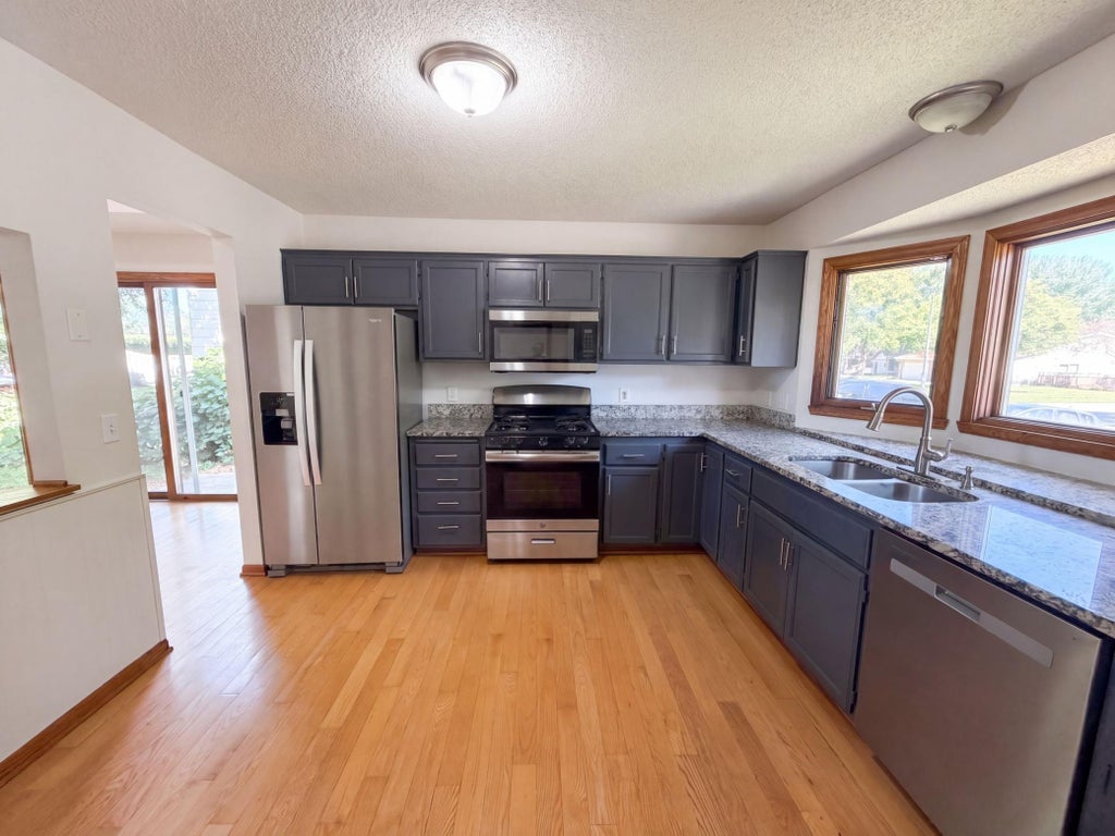 Photo of 7537 Fairfield Road N, Brooklyn Park, MN 55444 (MLS # 7142513)