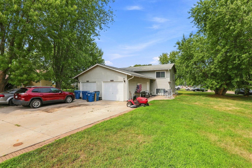 Photo of 10200 129th Avenue N, Champlin, MN 55316 (MLS # 7125826)