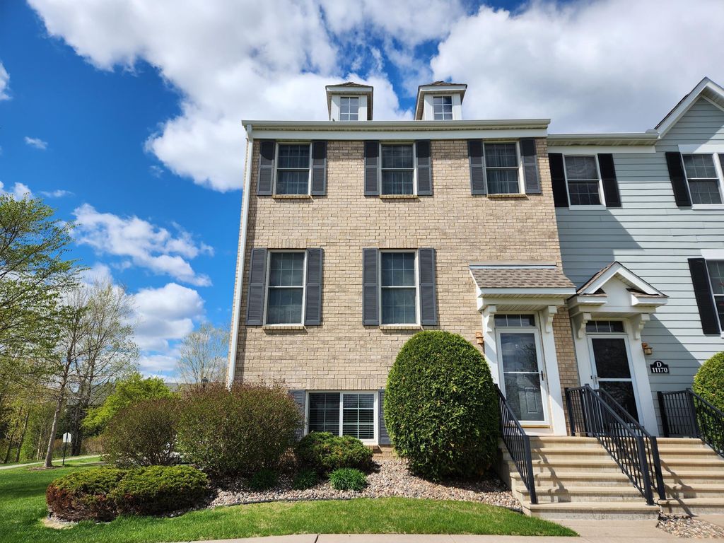 Photo of 11170 Sand Castle Drive #E, Woodbury, MN 55129 (MLS # 7065503)