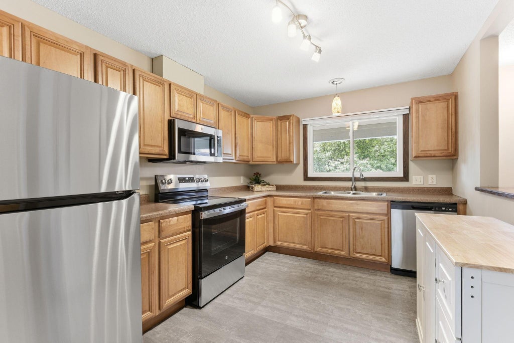 Photo of 7315 Stewart Drive, Eden Prairie, MN 55346 (MLS # 7074000)