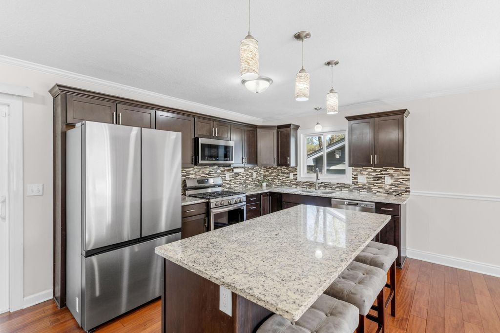 Photo of 6500 Annapolis Lane N, Maple Grove, MN 55311 (MLS # 7051893)