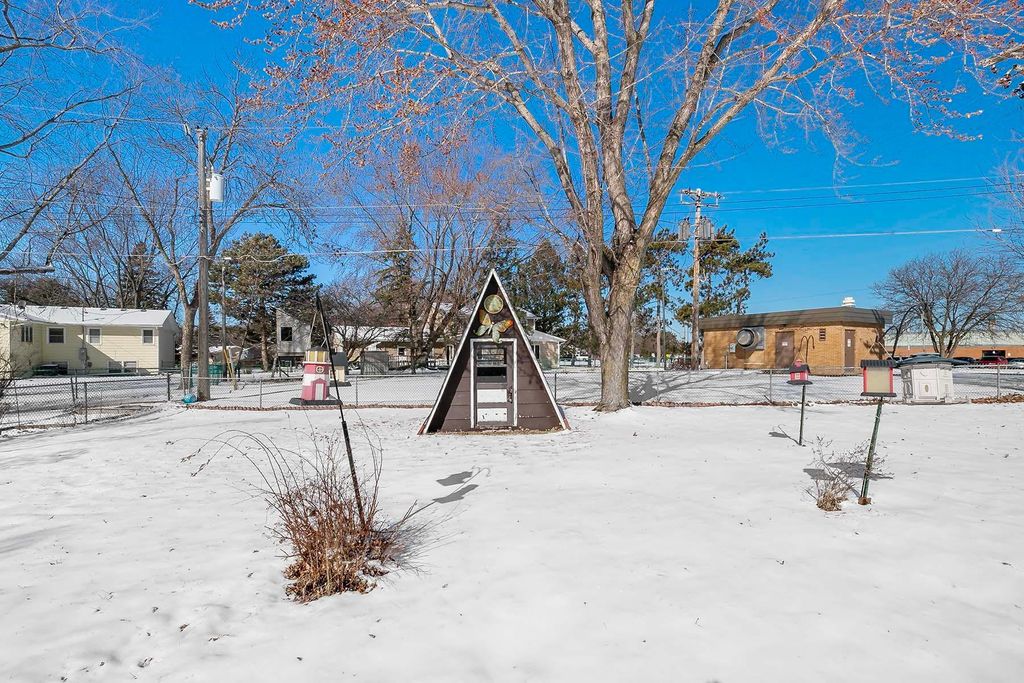 Photo of 10572 Crooked Lake Boulevard NW, Coon Rapids, MN 55433 (MLS # 7019544)