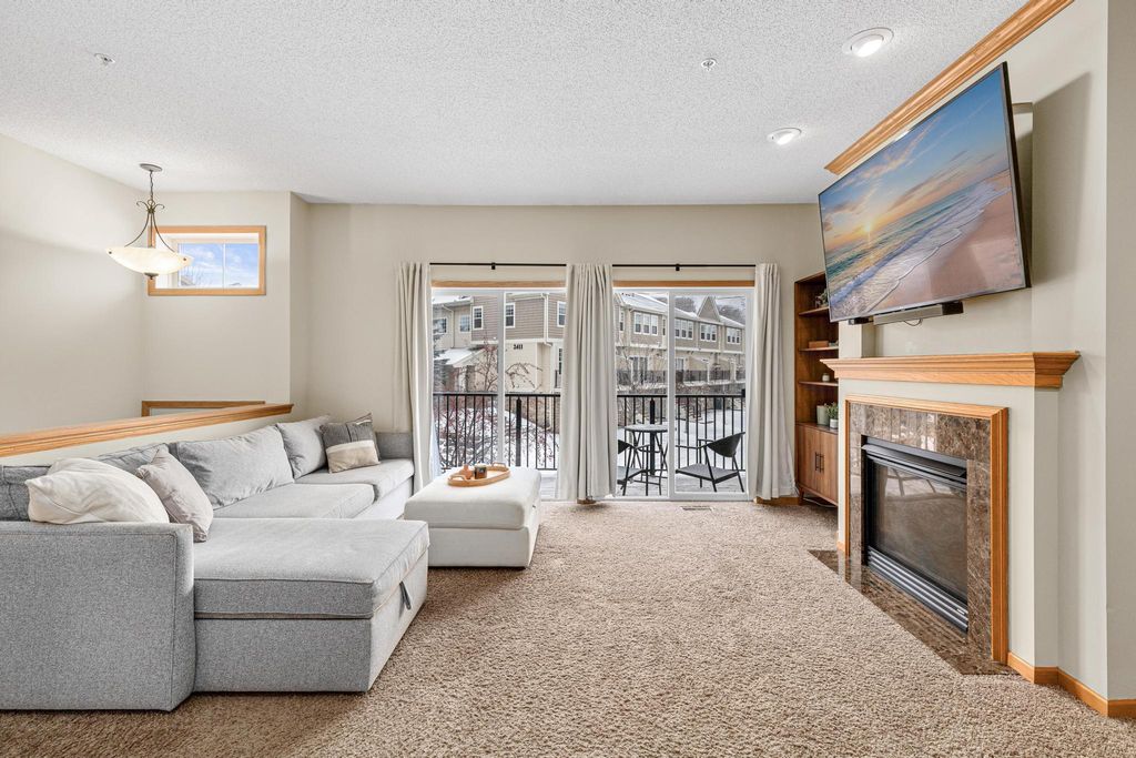 Photo of 2408 121st Circle NE #D, Blaine, MN 55449 (MLS # 7012251)