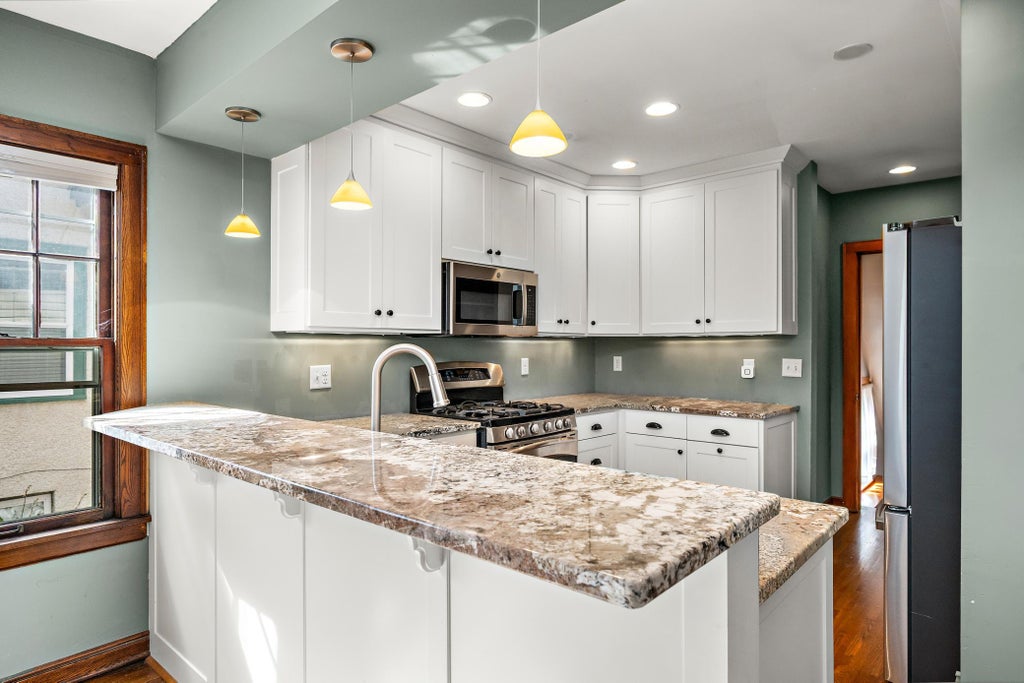 Photo of 3020 Garfield Street NE, Minneapolis, MN 55418 (MLS # 7119711)
