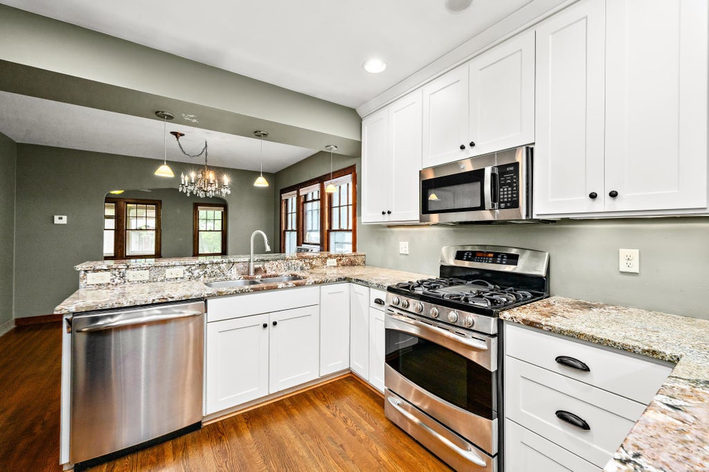 Photo of 3020 Garfield Street NE, Minneapolis, MN 55418 (MLS # 7119711)