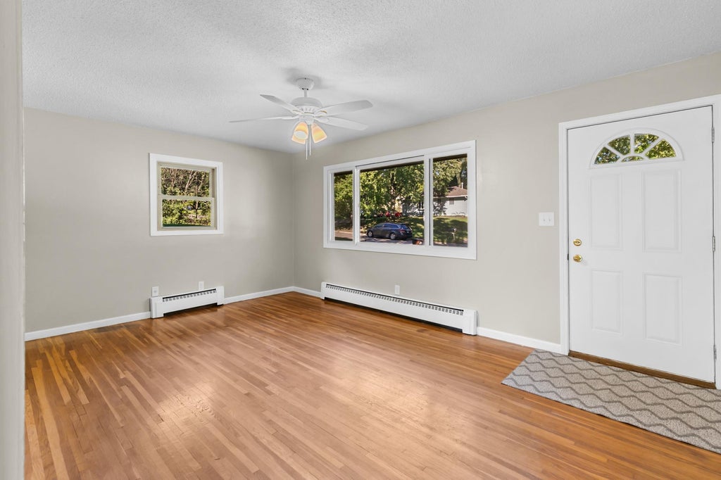 Photo of 610 Grange Avenue N, Oakdale, MN 55128 (MLS # 7147622)