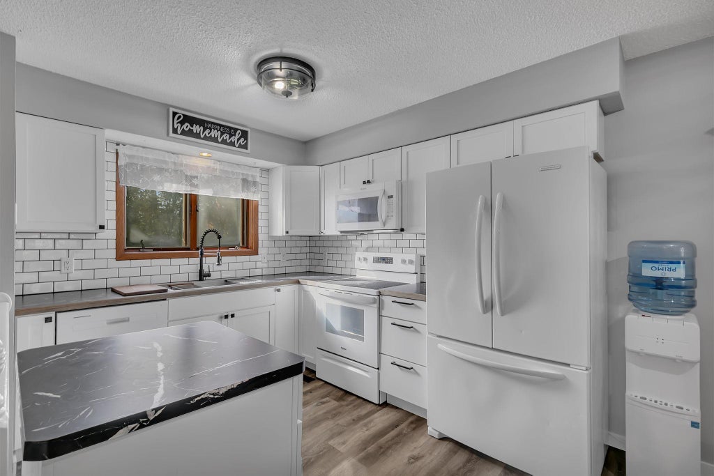 Photo of 128 9th Avenue SE, Saint Joseph, MN 56374 (MLS # 7153972)