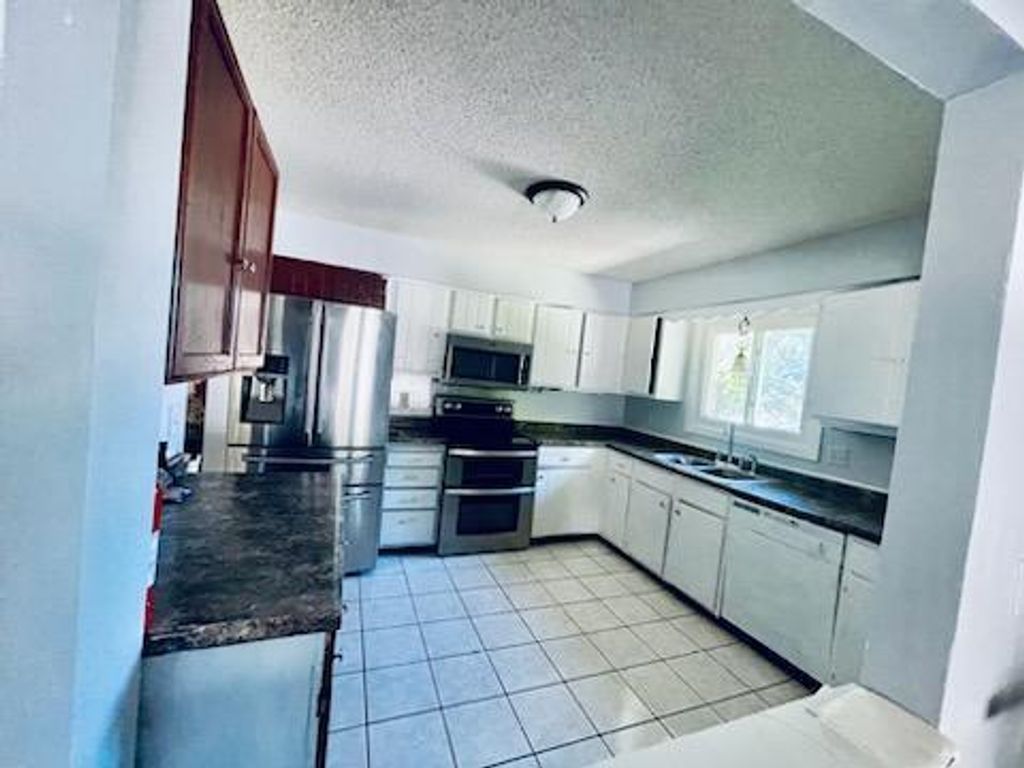 Photo of 504 Crestview Drive S, Maplewood, MN 55119 (MLS # 7010428)