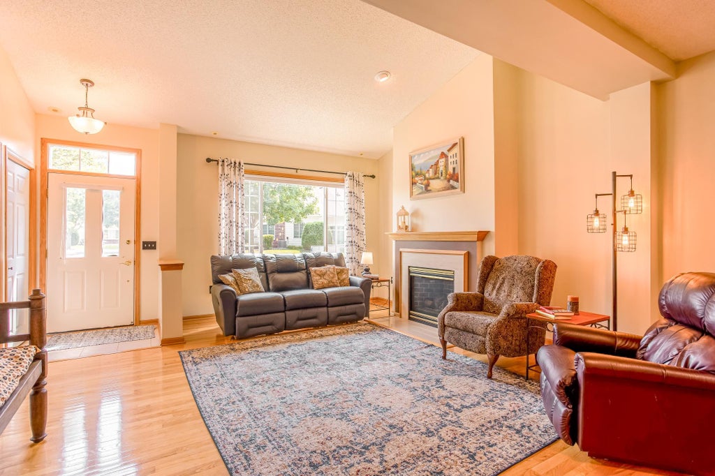 Photo of 11514 Baltimore Street NE #B, Blaine, MN 55449 (MLS # 7129581)
